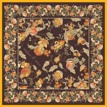Silk blend scarf with floral design and hand-rolled edges.