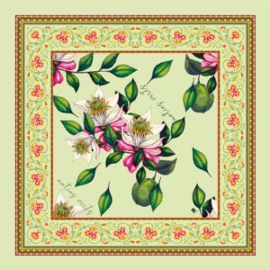 Luxurious green silk scarf with floral design and hand-rolled edges.