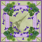 Silk blend Violette de Paris scarf with floral design and Eiffel Tower motif.